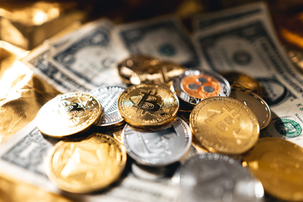 Crypto coins on gold background